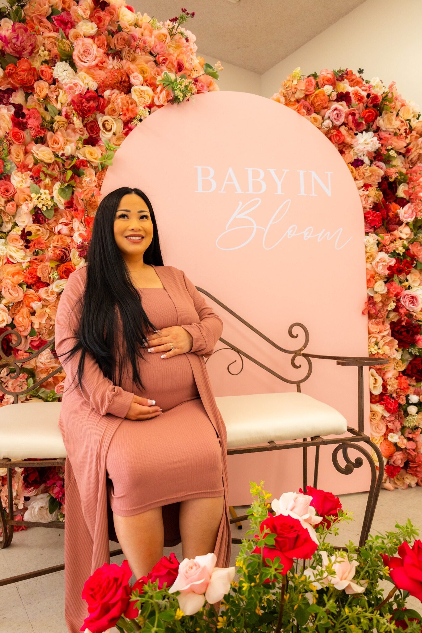 Expectant mother celebrating at a Baby in Bloom shower