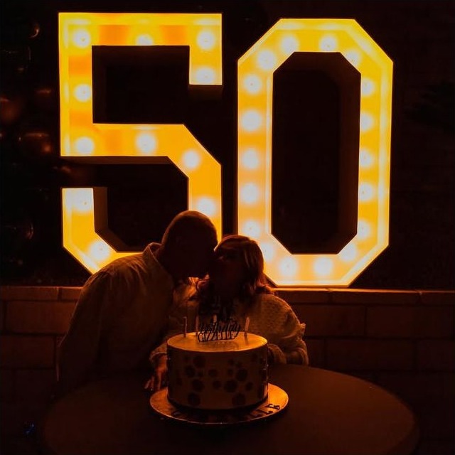Couple celebrating a fiftieth birthday