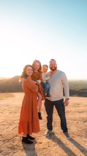 Family portrait in a sunlit desert landscape